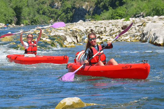 Two young kayakers enjoying their time on the Medium Descent route of the Ardèche