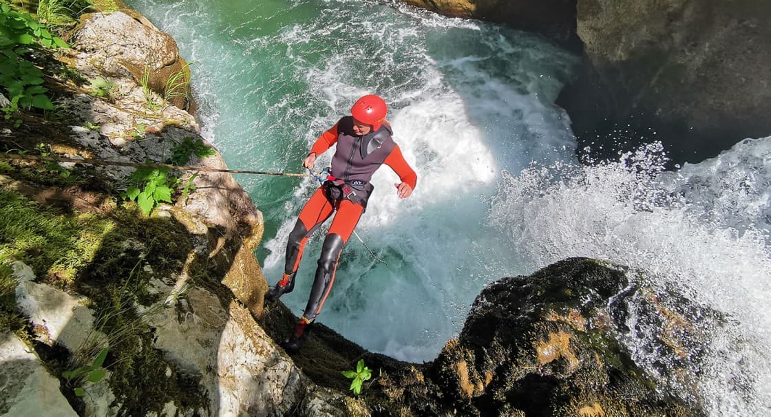 Group of adventurers preparing for canyoning with proper equipment in Ardèche