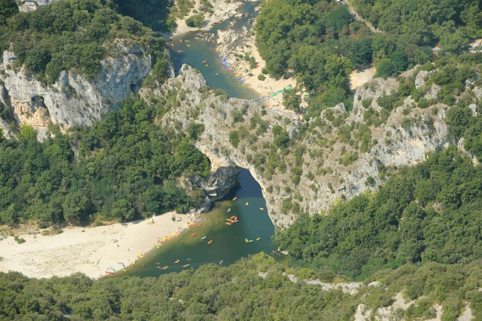 The iconic Pont d'Arc natural bridge, a testament to the geological processes that shaped the Ardèche landscape