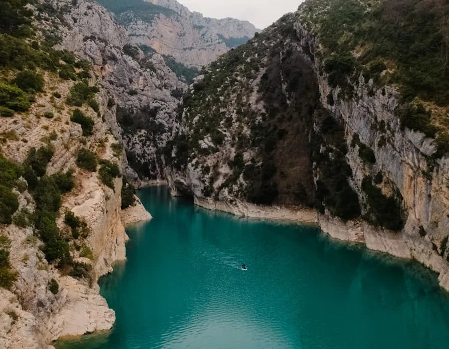Secluded canyon section of the Ardèche with natural rock formations and few visitors