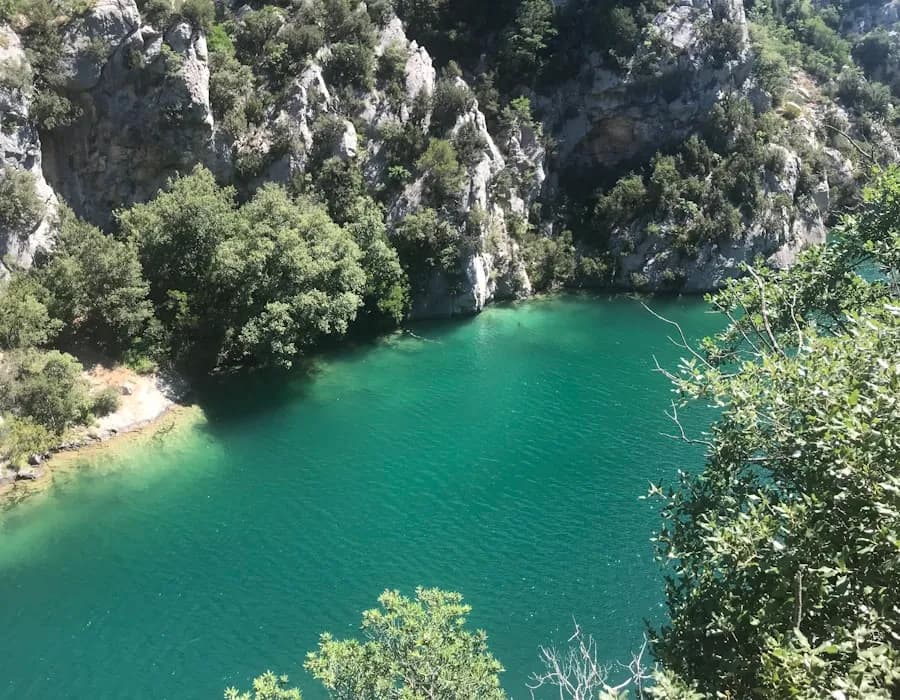 Kayaking through the crystal clear waters of the Ardèche River